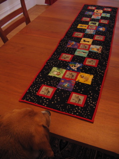 Huxley admires his table runner